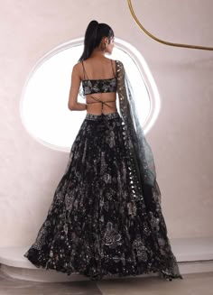 Add drama to your ensemble with a ruffled blouse, intricately embroidered lehenga, and a matching dupatta, blending modern flair with traditional craftsmanship Black Party Lehenga, Modern Indian Dress, Black Lengha, Phir Bhi Dil Hai Hindustani, Astha Narang, India Outfits, Mahima Mahajan, Fashion Course, Lehenga Style Saree