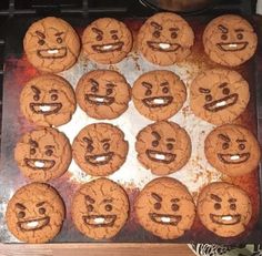 there are many cookies with faces on them