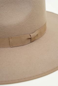 The Barry hat from Olive & Pique is a classic wool felt rancher hat featuring a tonal satin lining, hard brim and adjustable sizing. Brand: Olive & Pique Classic wool felt rancher Tonal satin lining Inner circumference: 58/59cm with an adjustable inner drawstring for sizing Brim length: 9.5cm, Crown height: 10cm ABOUT OLIVE & PIQUE Founded in 2000 and originally based out of Nu'uanu on the island of O'ahu, Hawai'i, what started as an artistic outlet for owner, Pri, has evolved into a revered hea Beige Boater Hat With Flat Brim For Fall, Beige Flat Brim Boater Hat For Fall, Fall Fur Felt Panama Hat With Flat Brim, Fall Fur Felt Boater Hat With Flat Brim, Fur Felt Brimmed Boater Hat For Fall, Wide Brim Fur Felt Boater Hat For Fall, Fall Wide Brim Fur Felt Boater Hat, Classic Brown Boater Hat With Flat Brim, Brown Flat Brim Boater Hat For Fall