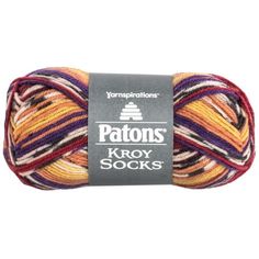 patons kroy socks yarn in multicolors on a white background,