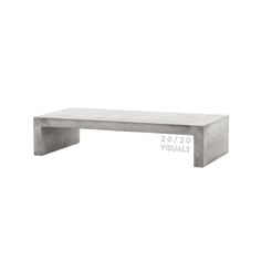 a concrete bench sitting on top of a white wall