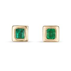 Elevate your style with our exquisite bezel-set emerald earrings, each showcasing mesmerizing Colombian emeralds with a medium vivid green hue and semi-transparent clarity. Crafted in luxurious 18k yellow gold and featuring an elegant latch-back closure, these earrings exude sophistication and timeless beauty, perfect for adding a touch of glamour to any ensemble. Setting Style: Bezel Setting Material: 18K Yellow Gold  Main Stone: Emerald  Count: 2 Shape: Emerald Cut Approx Weight: 1.85-Carats C Classic Green Earrings With Bezel Setting, Formal Emerald Earrings With Birthstone, Formal Emerald Birthstone Earrings, Green Bezel Set Earrings For Formal Occasions, Formal Green Earrings With Bezel Setting, Elegant Emerald Earrings With Bezel Setting, Yellow Gold Bezel Setting Earrings For May Birthstone, Yellow Gold Emerald Earrings With Bezel Setting, Emerald Studs