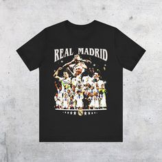 Real Madrid T-Shirt, Real Madrid Fans, Soccer T-shirts, Soccer fans, Gifts for Him. Streetwear Mens, Trending Now Shirts, Aesthetic Clothes .: Unisex Tee .: True To Size Fit (Size Up 1 for a Loose fit, Size Up 2 for an Oversized Look) .: Bella+Canvas Shirt Fan Merchandise T-shirt With Front Print, Graphic Print Crew Neck T-shirt For Fans, Crew Neck T-shirt For Fan Events, Crew Neck T-shirt With Front Print For Fan Events, Black T-shirt With Sublimation Print For Fan Events, Fan Apparel T-shirt With Letter Print, Band Merch Crew Neck T-shirt, Crew Neck T-shirt With Screen Print For Fan Events, Fan Apparel T-shirt With Front Print