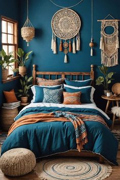 a bedroom with blue walls, wooden bed and rugs on the floor in front of it