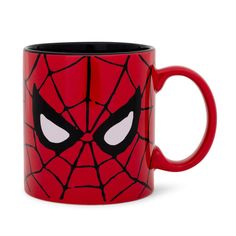 a red spider - man mug with white eyes