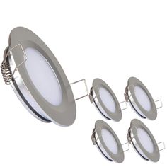 four dim downlights are shown on a white background