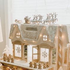 a white christmas house with lights and decorations