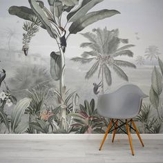 the wallpaper in this room is painted with tropical plants, birds and other things