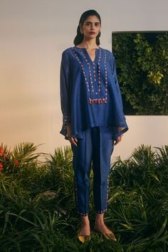 Cobalt blue thread embroidered flared top with multi color tassels. Paired with a silk chanderi thread embroidered pant and a short cotton slip. - Aza Fashions Cotton Slip, Flare Top, Embroidered Pants, Top And Pants Set, Fashion App, Aza Fashion, Pants Set, Multi Color, Silk