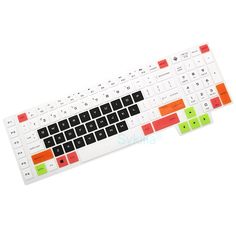 a white keyboard with orange, green and red keys on it's back side