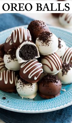 chocolate covered oreo balls on a blue plate