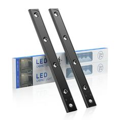 pair of black led cabinet door hinges in front of box on white background