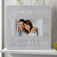 a wedding photo frame with the date and year printed on it