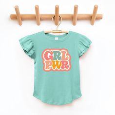 Looking for a cute tee for your daughter? We have the perfect flutter sleeve graphic tee. Trendy Cotton T-shirt With Ruffle Sleeves, Cute Summer T-shirt With Ruffle Sleeves, Pink Ruffle Sleeve T-shirt, Playful Cotton Tops With Flutter Sleeves, Playful Cotton Top With Flutter Sleeves, Playful Pink Flutter Sleeve Tops, Cheetah Shorts, Toddler Girl Outfits, Toddler Outfits