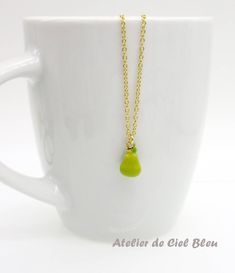 This dainty pear necklace is made of the followings: (1) gold plated green epoxy pear charm (14 x 8.5 mm) (2) gold plated or 14KGF chain and findings ✏️ Please choose the length of the chain (the length includes clasp and findings). ❣️ If you are unsure about which length to choose , please leave me a note to request an extension chain to be added to the chain at check out. 🍐EARRINGS 🍐 Hooks -> https://www.etsy.com/listing/919575709 🍐OTHER STYLE 🍐 YELLOW PEAR → https://www.etsy.com/listin Green Drop Necklace With Adjustable Chain As Gift, Green Pear-shaped Necklace For Gift, Green Pear Shaped Necklace Gift, Green Pear Shaped Necklace For Gift, Gold Pear-shaped Drop Necklace For Gift, Yellow Teardrop Necklace For Gifts, Handmade Pear-shaped Necklace Gift, Handmade Pear-shaped Gold Necklace, Pear-shaped Yellow Necklace For Gift