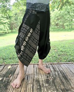 Item details Materials cotton,  hmong fabric, thai, japanese print FEATURE: Handmade Ethically, Breathable, Unisex, Comfortable to Wear & Stylish. MATERIAL: 100% Cotton, Handmade  Sizing : Tie Waist or Wrap pants Waist up to : 21 inch 44 inch ( 53.36 -111.75 cm ) Hip up to : 64 inch ( 142 cm ) Length     : 34 inch ( 78 Cm ) 1 Pocket COLOUR: Black Special Promotion  -Shipping by priority mail to USA Next all item get Free priority mail to USA  Non USA shipping by Air Mail registered. GENDER: M/F This beautiful samurai pants is unique & comfortable to wear. Handmade with very lovely pattern, it is easy to wear and great for many occasions. Unique handmade embroidered waist patches are made with Cotton fabric, each pair are a slight different which makes them an one-of-a-kind. One size fits m Hmong Fabric, Pattern Trousers, Samurai Pants, Fisherman Pants, Japanese Print, Wrap Pants, Elephant Pattern, Hip Ups, Japanese Prints