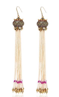 Shell Pearl Long Tassels Shoulder Duster Earrings This product has been crafted by hand and may have slight irregularities or imperfections in color or embellishment. These irregularities are the result of the human involvement in the process and add to the finished products charm while ensuring you have a one-of-a-kind piece. LENGTH Earrings Length - 10 cm Closure - Push Pin DETAILS -100% top Quality Faux Glass Polki -22K gold and silver Plated silver copper alloy. -Handcrafted in our all girls Traditional Long Drop Earrings With Dangling Beads, Dangle Tassel Earrings For Festivals, Traditional Beaded Dangle Earrings With Tassels, Traditional Tassel Earrings For Party, Festival Tassel Dangle Earrings, Traditional Tassel Earrings For Festive Occasions, Traditional Beaded Tassel Dangle Earrings, Festive Dangle Pearl Earrings With Latkans, Traditional Tassel Drop Beaded Earrings