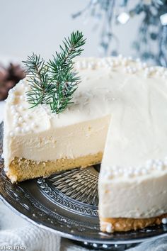 a piece of cheesecake on a glass plate