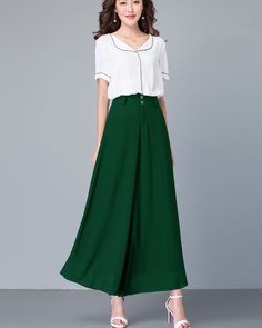 * Wide-leg skirt-shaped pants spun with high-quality chiffon fabric. * Wide waistband and A-line shape, make you look more taller and thinner. *Material: 100% chiffon *Let us know your regular size and overall height in your country. *The waist size and length can be customized. *Size: True to US size, can provide US 0 to US 20 , you can tell us your usual size and height when ordering. * Shipping: Free shipping Processing time: 5-7 working days Delivery time: 7-20 working days Formal Summer Flowy Skirt, Fitted Long Chiffon Skirt, Formal Long Skirt With Elastic Waistband, Solid Color Wide Leg Maxi Skirt For Work, Wide Leg Maxi Skirt For Work, Formal Chiffon Bottoms For Spring, Summer Formal Chiffon Bottoms, Chiffon Wide Leg Pants For Work, Chiffon Pleated Long Skirt