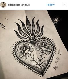 a drawing of a heart with flowers on it