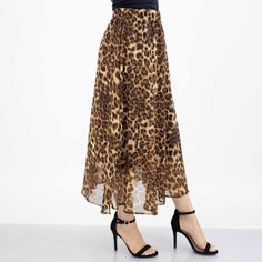 Sheer a-line leopard print midi skirt with elastic waist and black inner skirt. Nice for evenings out, lunch dates or office wear. Sizes: SM - XL Material: 100% polyester Care: Machine wash with cold water Leopard Print Long Skirt For Spring, High Waist Leopard Print Skirt For Fall, Long Leopard Print Skirt For Spring, Trendy High Waist Leopard Print Skirt, Spring Leopard Print Midi Skirt, Flowy Leopard Print Skirt For Spring, Leopard Print Flowy Long Skirt, Flowy Long Leopard Print Skirt, Long Flowy Leopard Print Skirt