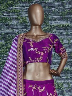 This elegantly designed bridal wedding Sabyasachi designer lehenga in dual-tone mulberry silk is further enhanced with badla, sequins, thread, and dori work all over.
Accompanied by a matching embellished Mulbury Silk choli along with matching white purple stripes printed khadi Organza dupatta which adds ease to the final look.
the lehenga and choli making it look mesmerizingly beautiful. This lehenga is semi-stitched and can be customized up to 42 sizes. Semi-stitched Tussar Silk Choli With Dori Work, Semi-stitched Embroidered Lehenga In Art Silk, Semi-stitched Embroidered Art Silk Lehenga, Embroidered Semi-stitched Art Silk Lehenga, Semi-stitched Lehenga With Intricate Embroidery In Silk Thread, Purple Chanderi Traditional Wear With Dori Work, Semi-stitched Purple Sharara With Resham Embroidery, Anarkali Art Silk Choli With Unstitched Blouse, Diwali Embroidered Tussar Silk Choli