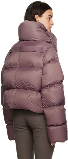 Lightweight down-filled GRS-certified recycled nylon satin jacket. · Press-stud fastening at funnel neck · Zip closure · Welt pockets · Cropped hem · Inset rib knit wool cuffs · Webbing strap at back yoke · Fully lined Supplier color: Amethyst Fill: 90% down, 10% feathers. Winter Puffer Outerwear In Polyamide, Winter Polyamide Puffer Outerwear, Winter Puffer Outerwear Made Of Polyamide, Winter Nylon Puffer Jacket With Ribbed Cuffs, Winter Outerwear With Ribbed Cuffs And Duck Down, Winter Polyamide Outerwear With Padded Collar, Winter Outerwear With Padded Collar In Polyamide, Satin Jacket, Webbing Strap