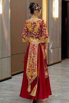 Indulge in a traditional Chinese bridal gown with this stunning 2-piece qun kwa set, adorned with intricate embroidery in gold, silver, and white. The embroideries of a dragon and phoenix, representing eternal love, are carefully placed throughout the jacket and skirt. This celestial couple is the embodiment of matrimonial bliss. Perfect for a traditional Chinese wedding or tea ceremony. The qun kwa set come with 2 options: With crystals/hot drill decoration or no crystal/hot drill . Size availa Phoenix Embroidery, Red Bride, Qun Kwa, Traditional Chinese Wedding, Bridal Attire, Qipao Cheongsam, Wedding Essentials, Chinese Wedding, Red Envelope