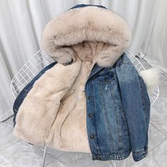 Winter Fitted Denim Outerwear, Fitted Denim Winter Outerwear, Hooded Denim Jacket For Winter, Hooded Denim Winter Outerwear, Trendy Hooded Denim Jacket For Winter, Winter Long Sleeve Fitted Denim Jacket, Winter Denim Jacket With Faux Fur Trim, Winter Denim Outerwear For Cold Weather, Fitted Winter Denim Jacket