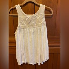 Never Worn Still With Tags Excellent Condition. Size Large Casual Sleeveless Embroidered Top For Vacation, Casual Embroidered Top For Vacation, Casual Embroidered Tank Top For Spring, Casual White Tank Top With Floral Embroidery, Casual Fitted Embroidered Top For Vacation, Casual Embroidered Tank Top For Vacation, Casual Sleeveless Embroidered Top, Casual White Sleeveless Embroidered Top, Cheap Bohemian V-neck Camisole