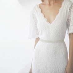 Ivory wedding dress with a lace bodice, Vintage style wedding The wedding dress has a modest yet vintage style, floor-length hemline, delicate v-neck, and is carefully crafted using the finest soft lace.A refined and classic fit designed for style, comfort, and form. The maxi lace wedding dress is graceful and is a tim Timeless Wedding Gown, Bead Applique, Wedding Belt, Wedding Sash Belt, Wedding Belts, Vintage Style Wedding, Ivory Wedding Dress, Blush Dresses, Bridal Belt