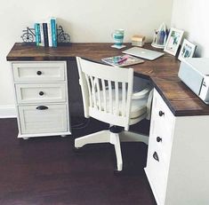 a desk with two drawers and a chair