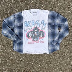 Upcycled from a second-hand t-shirt and flannel. Size: Can fit XS-2XL (Model is typically a size small for reference) Length: 30" Pit to Pit: 30" Sleeve: 25" Vintage Cotton Flannel Shirt For Streetwear, Casual Reworked Tops For Streetwear, Long Sleeve Flannel Top With Graphic Print, Retro Plaid Top With Graphic Print, Vintage Relaxed Fit Flannel Top, Vintage Flannel Relaxed Fit Top, Vintage Flannel Top With Relaxed Fit, Casual Reworked Short Sleeve Top, Casual Crew Neck Upcycled Top