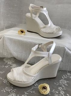 Anatomical base structure 6cm , 8 cm , 10 cm , 11 cm , 12 cm ,13 cm and 14 cm heel length options Special non-slip bottom sole Ivory or white color pltions An indispensable part of the wedding day . A combination of elegance and comfort. It is a product that you will feel as if you are wearing sports shoes with the comfort of padding heel. Elegant White Wedge Sandals For Wedding, White Wedge Heel Sandals For Wedding, White Wedge Sandals For Wedding, White Wedge Heel Heels For Wedding, Wedding Sandals With Removable Insole And Wedge Heel, Wedding Open Toe Wedge Sandals With Removable Insole, Elegant Platform Wedge Sandals For Wedding, Elegant White Closed Toe Wedge Sandals, Elegant White Ankle Strap Wedge Sandals