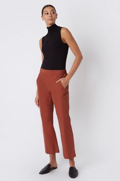 Fall calls for ease with our elastic waist Brit Crop Pant. With a mid-rise fit, angle seam pockets and the perfect leg opening, this style is a breeze to wear in the cooler weather. Pair it with your favorite ankle boot or sneaker, this style is designed for women on the go.THIS ITEM IS FINAL SALE. 1.5" front waistband, elastic at sides and back, angle seams with front pockets, midrise, easy fit, clean finish hem. - 51% Cotton, 49% Nylon - Fabric Woven in Italy - Made in NYC - Professional dry c Perfect Legs, Cooler Weather, Nylon Fabric, Cropped Pants, Woven Fabric, The Go, Final Sale, Mid Rise, Elastic Waist