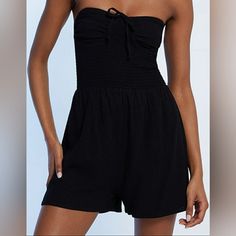 Questions? Leave A Comment Below! The La Hearts Strapless Smocked Bodice Romper Is Summer-Friendly And Swoon-Worthy With Its Easy-To-Pull-On Fit And Breathable Material. This Romper Also Features A Strapless, Square Neckline, A Smocked Bodice, And A Front Tie Detail. Strapless Smocked Bodice Front Tie Detail Romper Silhouette Black Sleeveless Jumpsuits With Smocked Back, Summer Black Bottoms With Smocked Back, Black Smocked Back Bottoms For Summer, Black Smocked Bodice Jumpsuit For Spring, Black Smocked Bodice Jumpsuits And Rompers For Spring, Spring Black Jumpsuit With Smocked Back, Black Jumpsuits And Rompers With Smocked Back For Spring, Strapless Beach Jumpsuits With Smocked Bodice, Black Jumpsuits And Rompers With Elastic Waistband For Beach