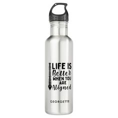 a stainless steel water bottle with the words life is better when you are aligned