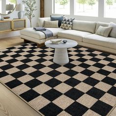 a black and white checkered rug in a living room