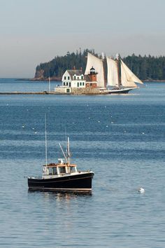 a boat floating on top of a large body of water