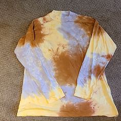 Nwt Free People Cotton Tie Dye Long-Sleeved Shirt With Mock Neck. Light Weight, 100% Cotton Perfect For Summer Evenings Or Transition To Fall. Colors Are Yellow, Light Purple And Rust/Orange. (Color On Tag Is "Lilac Woods") Slightly Oversized Fit. Size Small And Medium Available. S Smoke Free Home. Yellow Long Sleeve Tops For Fall, Mustard Long Sleeve Cotton Shirt, Yellow Relaxed Fit Long Sleeve T-shirt, Yellow Long Sleeve T-shirt For Spring, Fall Yellow Crew Neck Shirt, Yellow Long Sleeve Cotton Top, Fall Yellow Cotton Tops, Yellow Crew Neck Shirt For Fall, Yellow Long Sleeve Tops For Spring