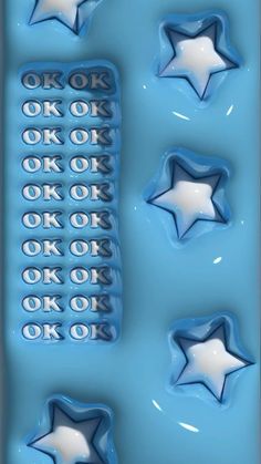 blue and white star shaped chocolate molds with the words ok to ok on them