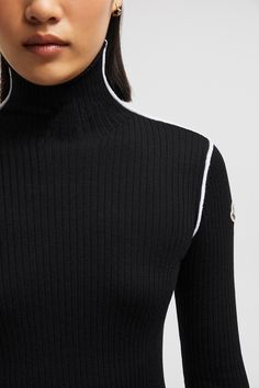 Featuring a sleek design, this turtleneck sweater is featured in a slim, figure-hugging fit. The lightweight knit is crafted from a luxurious wool, cashmere and viscose blend. Wool Tops With Funnel Neck, Luxury Fitted Cashmere Tops, Luxury Black Fitted Sweater, Modern Fitted Sweater, Elegant Fitted Turtleneck With Ribbed Cuffs, Black Fitted Luxury Sweater, Luxury Fitted Black Sweater, Luxury Fitted Merino Wool Top, Luxury Fitted Crew Neck Sweater