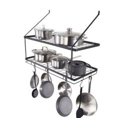 a rack with pots and pans hanging from it's sides on a white background