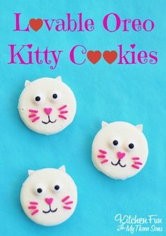 three white cats made out of cookies on a blue background with the words loveable oreo kitty cookies