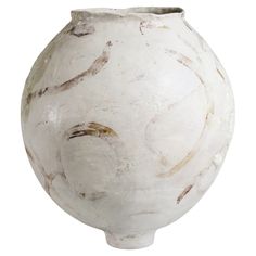 a white vase is shown on a white background