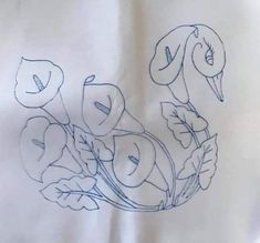 a drawing of flowers and birds on a white sheet with blue ink in the middle