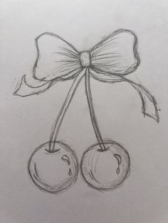 a drawing of two cherries tied with a bow