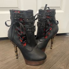 Brand New With Minor Flaws On The Back Above The Heel. See Pics. Turn Heads On Your Next Night Out With The Demonia Muerto 1030 Ankle Bootie. Finished With A Finger Bone Heel, This Eye-Catching Bootie Features A Back Zipper And Triple Buckle Straps. Black Edgy Platform Boots With Ankle Strap, Black Platform Boots With Ankle Strap, Black High Heel Boots With Heel Loop, Black Closed Toe Moto Boots For Party, Black Punk Boots With Ankle Strap, Black Punk Ankle Strap Boots, Black Moto Boots For Party, Punk Ankle Strap Boots For Party, Platform Moto Ankle Boots For Party