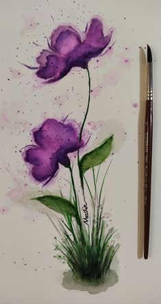 watercolor painting of purple flowers on white paper