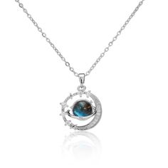 Enter the celestial realm with our mesmerizing silver blue Astrology Night necklace, meticulously crafted from resilient 316L stainless steel.  Each pendant captures the enchanting allure of the night sky, adorned with celestial symbols and hues of deep blue, evoking a sense of wonder and mystery. Symbolizing cosmic connections and the infinite universe, this necklace invites you to explore the depths of the cosmos. The sleek silver design adds a touch of elegance, making it a versatile accessor Silver Celestial Pendant Jewelry, Celestial Style Silver Round Pendant Jewelry, Celestial Silver Jewelry With Round Pendant, Celestial Silver Crescent Jewelry, Silver Crescent Gemstone Necklace, Celestial Star-shaped Sterling Silver Jewelry, Blue Mystical Necklace With Moon Charm, Silver Moon Phase Crystal Necklace, Celestial Silver Gemstone Necklace